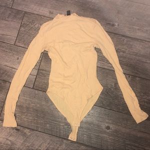 awesome pale pastel yellow bodysuit